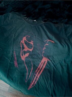 Black Graphic Tee with Red Knife Design